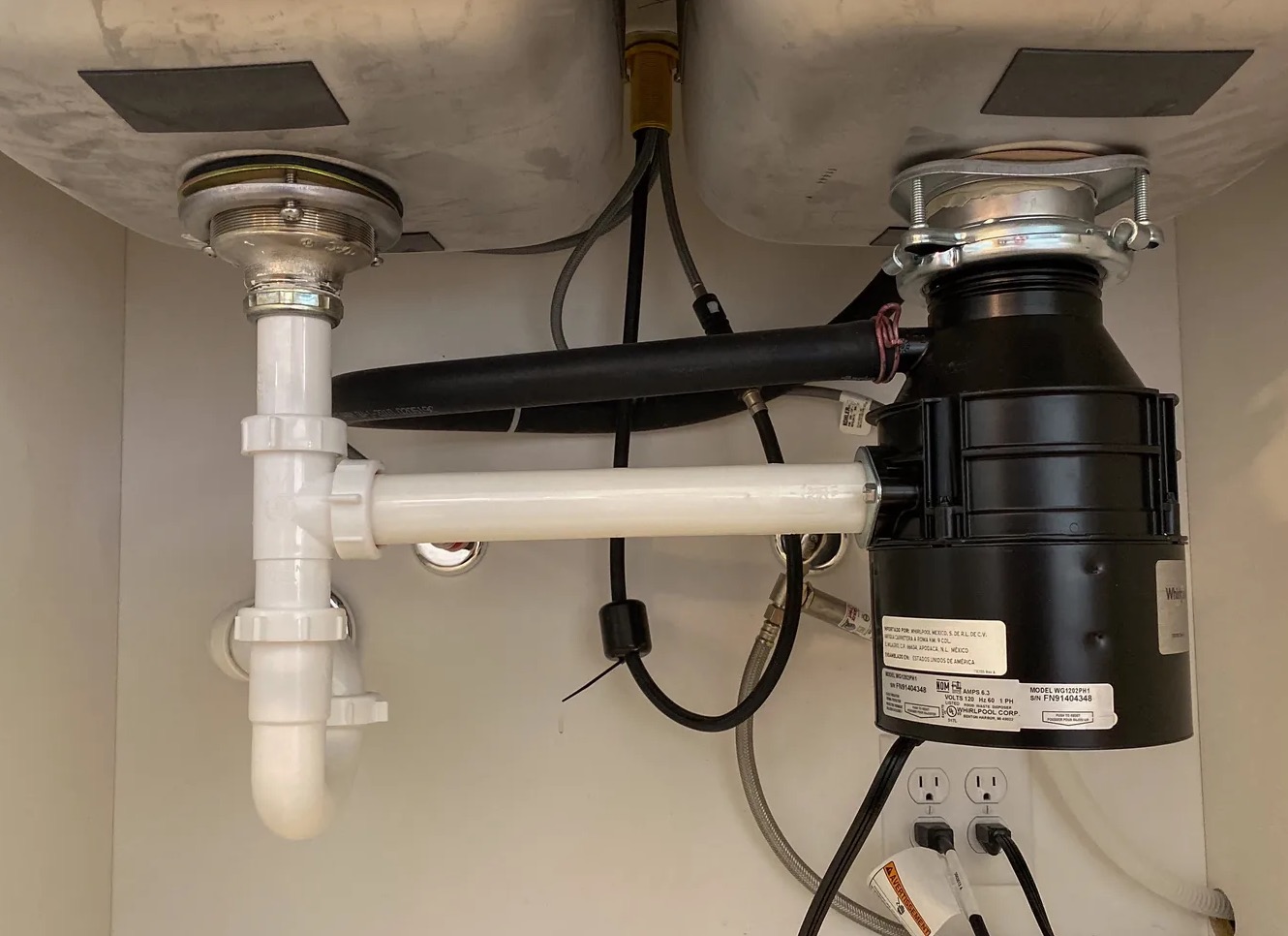 Leaky Garbage Disposal Cleanup in Flower Mound, TX